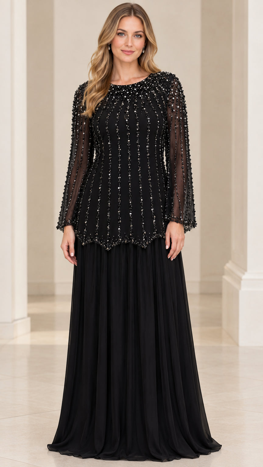 Front view of woman wearing Black beaded long sleeve evening gown with pleated chiffon skirt