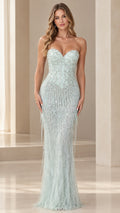 Front view of model wearing mint green strapless sweetheart beaded fringe gown