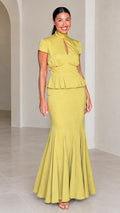 Front full-length view of woman wearing Chartreuse high neck peplum mermaid maxi dress set