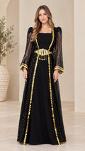 Front full view of black sequin overlay kaftan maxi dress with gold coin trim and belt
