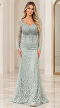 Front view of woman wearing a sage green long sleeve beaded mermaid evening gown