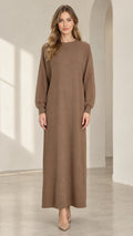 Front view of woman wearing mocha brown textured knit long sleeve maxi sweater dress