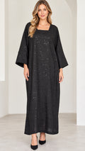 Front view of model wearing black square neck sequin embellished kaftan maxi dress