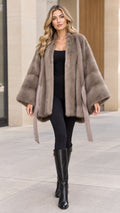 Taupe belted faux fur cape coat front view on blonde model