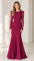 Full front view of model wearing burgundy long sleeve swiss dot mermaid evening gown