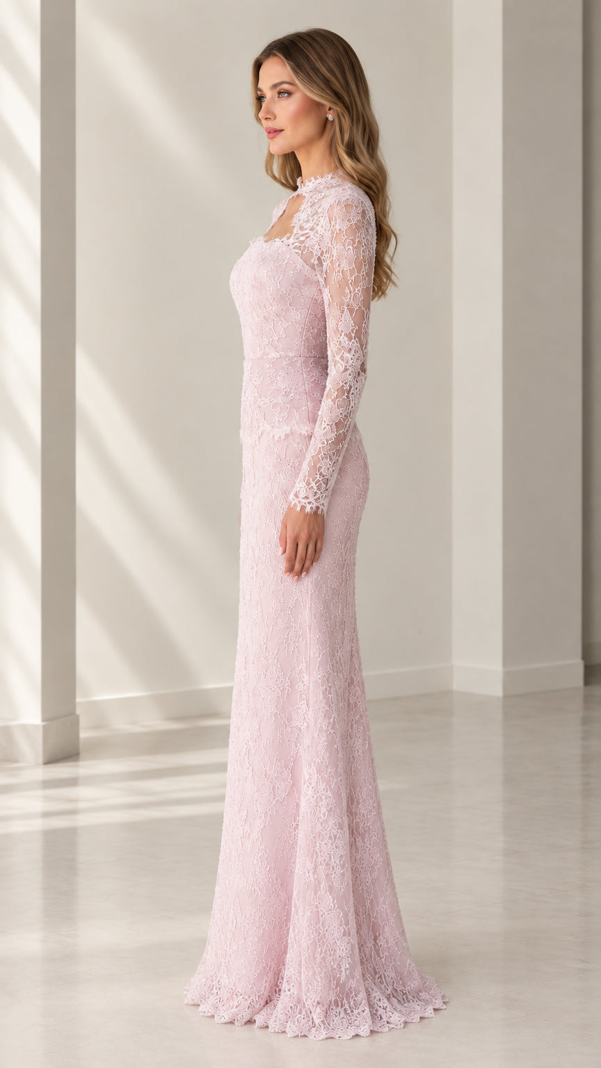 Side profile of woman in blush pink floor length lace gown