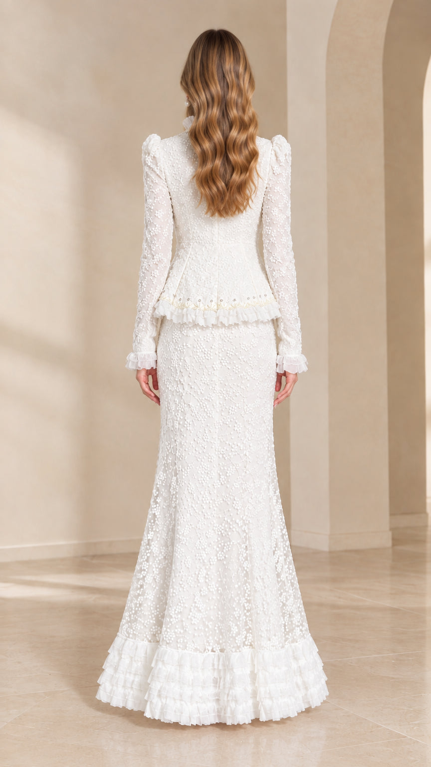 Back view of woman wearing white lace peplum top and long mermaid skirt