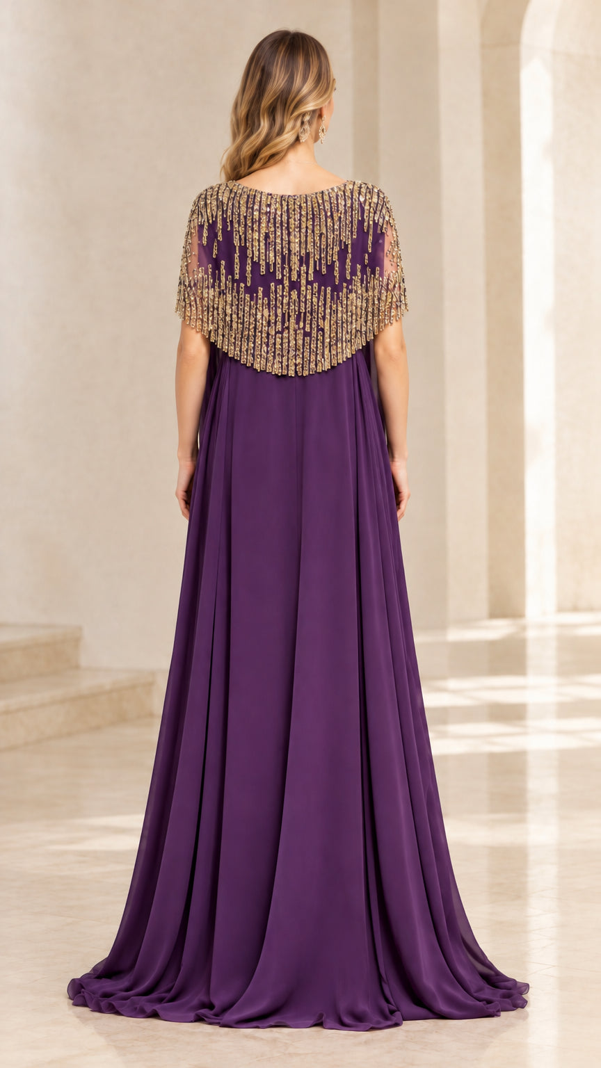 Back view of purple evening gown showcasing the beaded capelet overlay