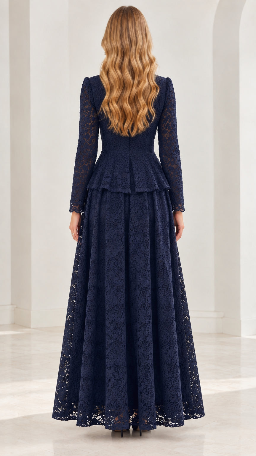 Back full-length view of navy blue floral lace peplum gown