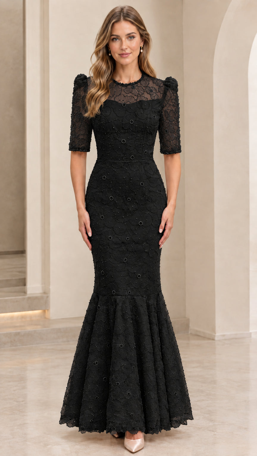 Front view of model wearing black floral lace mermaid evening dress