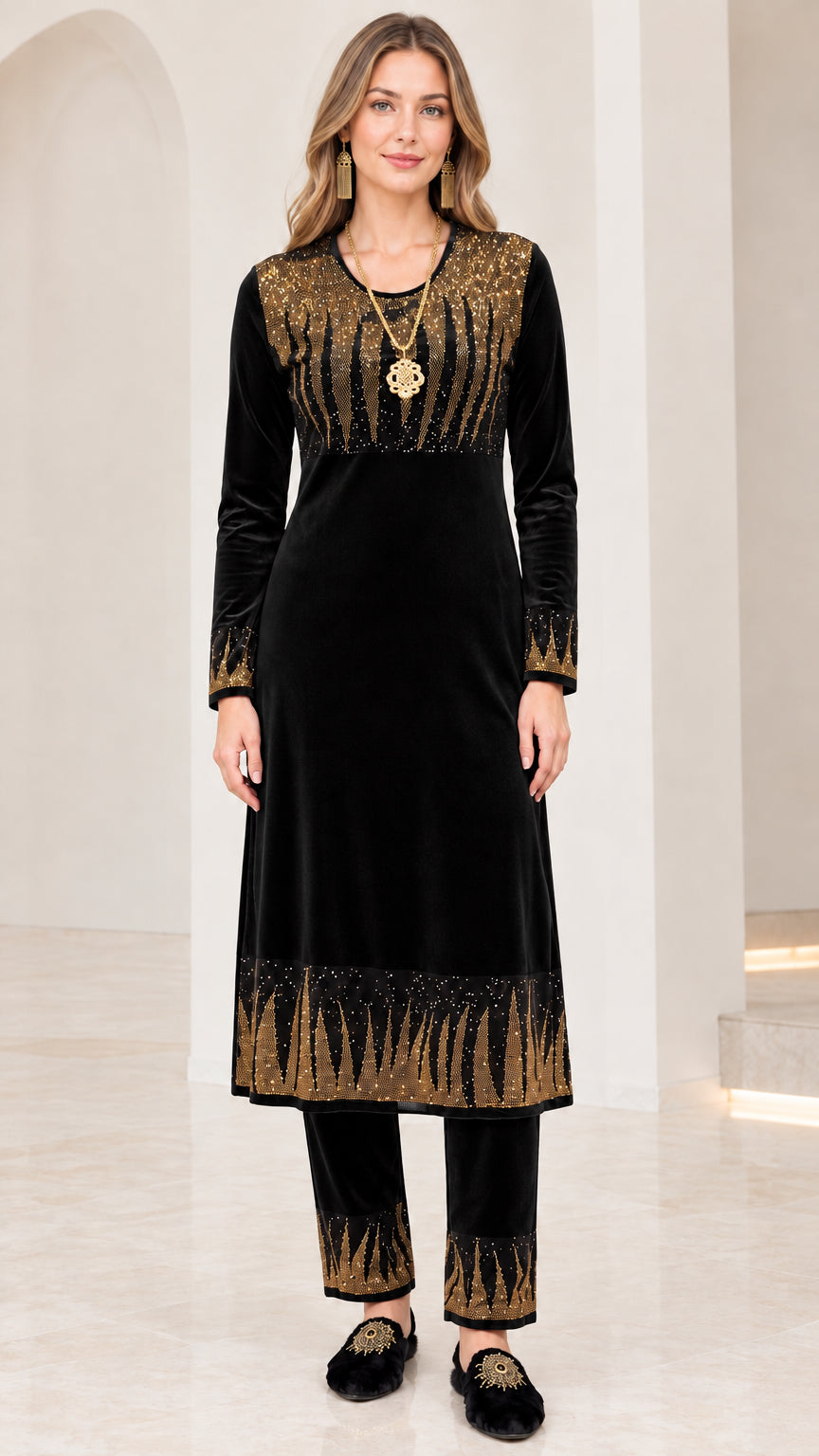 Full front view of women's black velvet tunic and trouser two-piece set with gold detailing