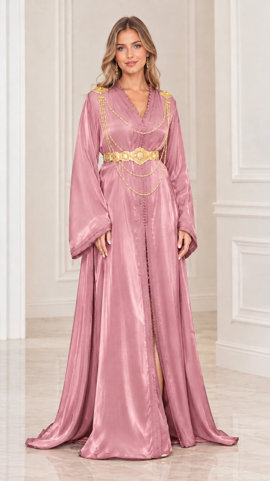 Front view of dusty rose pink satin caftan gown with gold chain detailing