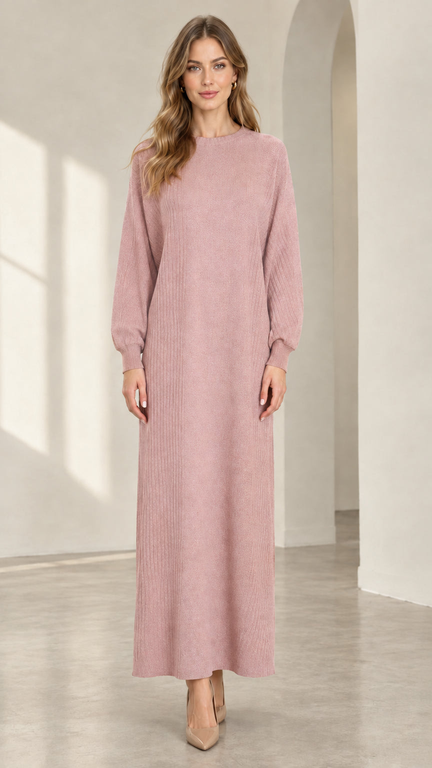 Front view of woman wearing dusty pink textured knit long sleeve maxi dress