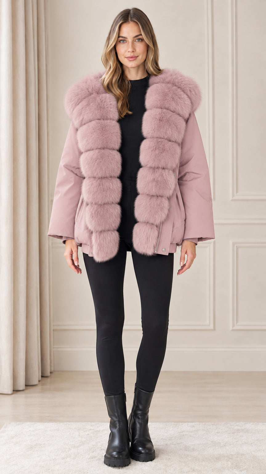 Front view of model wearing dusty pink plush trim hooded winter jacket