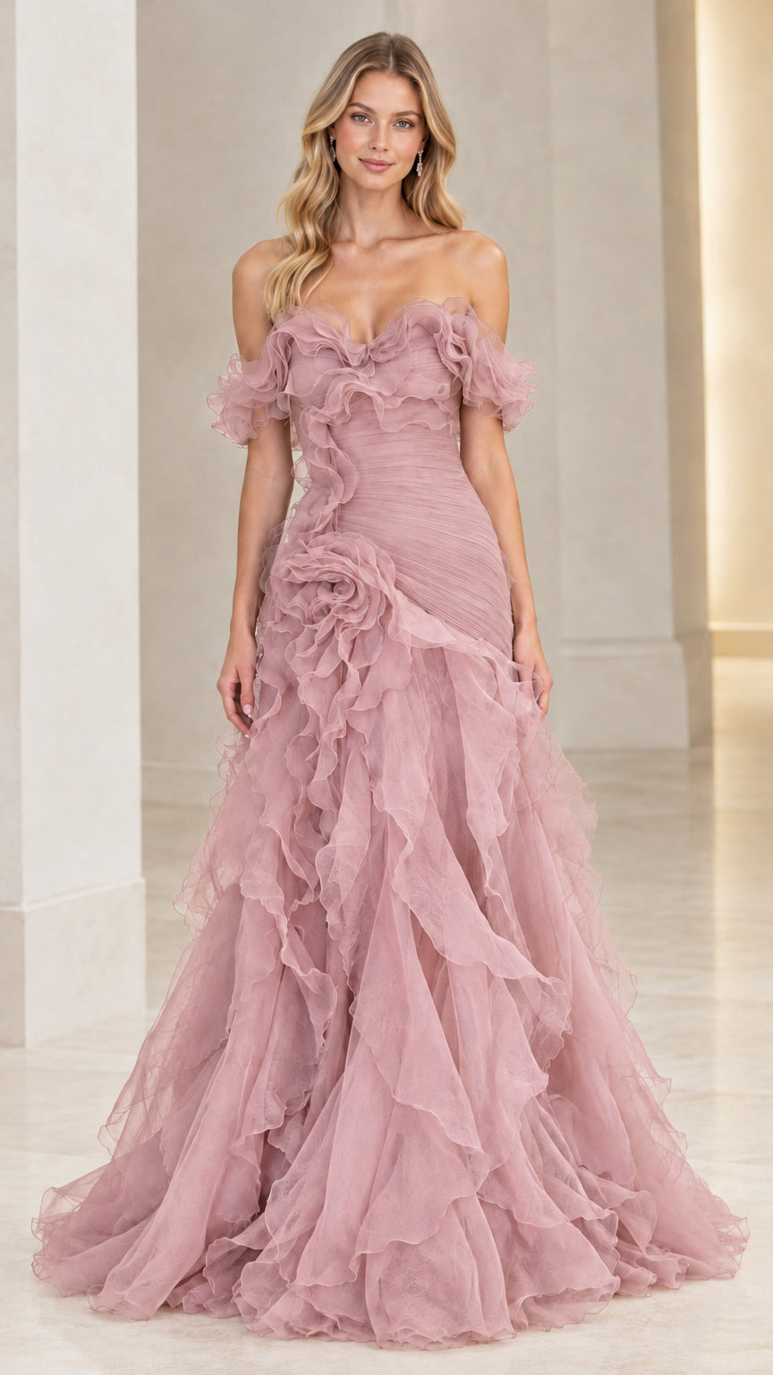 Model wearing dusty rose pink tiered ruffle tulle formal ball gown