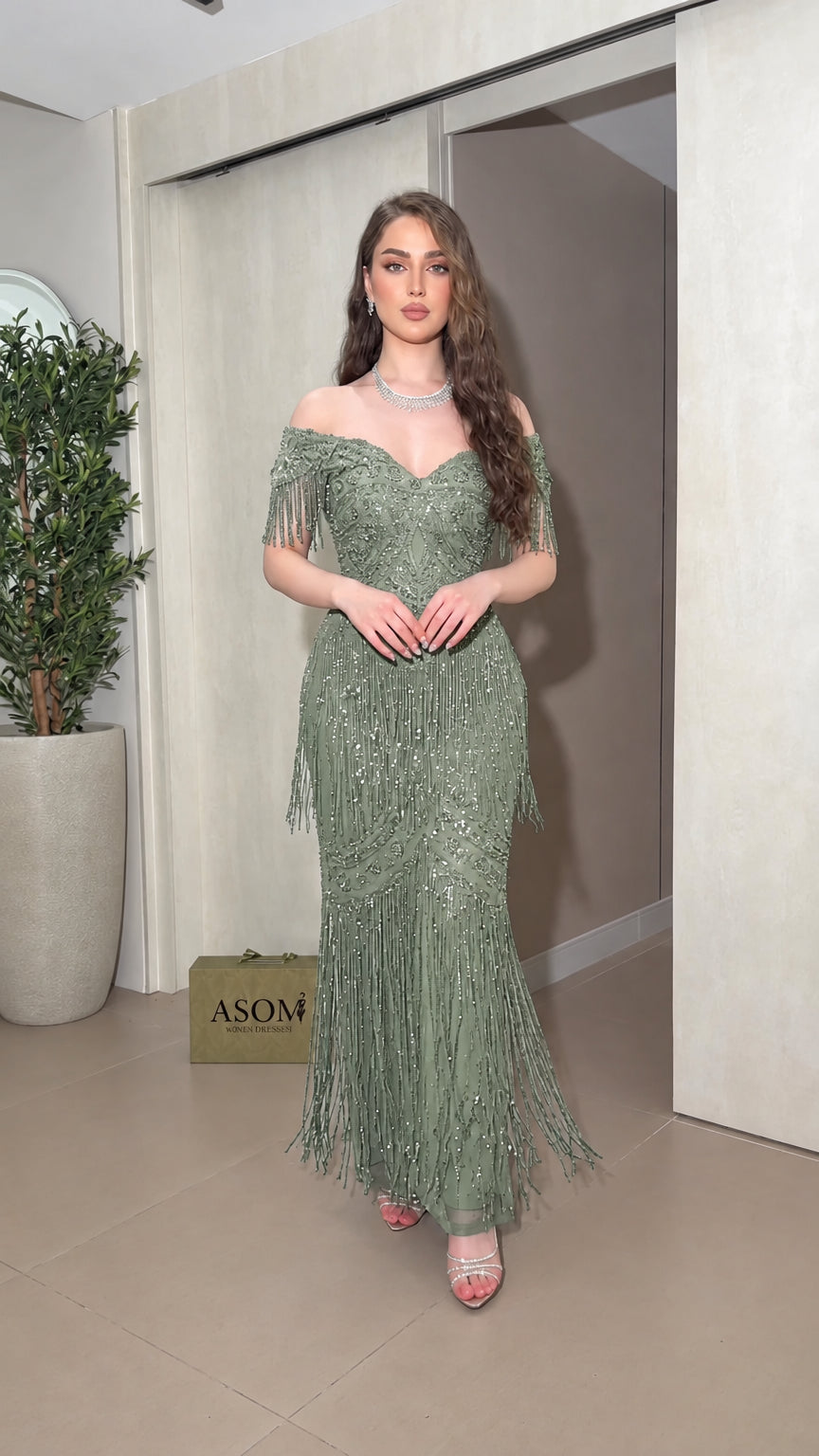 Sage green sequin embellished off-the-shoulder formal maxi gown