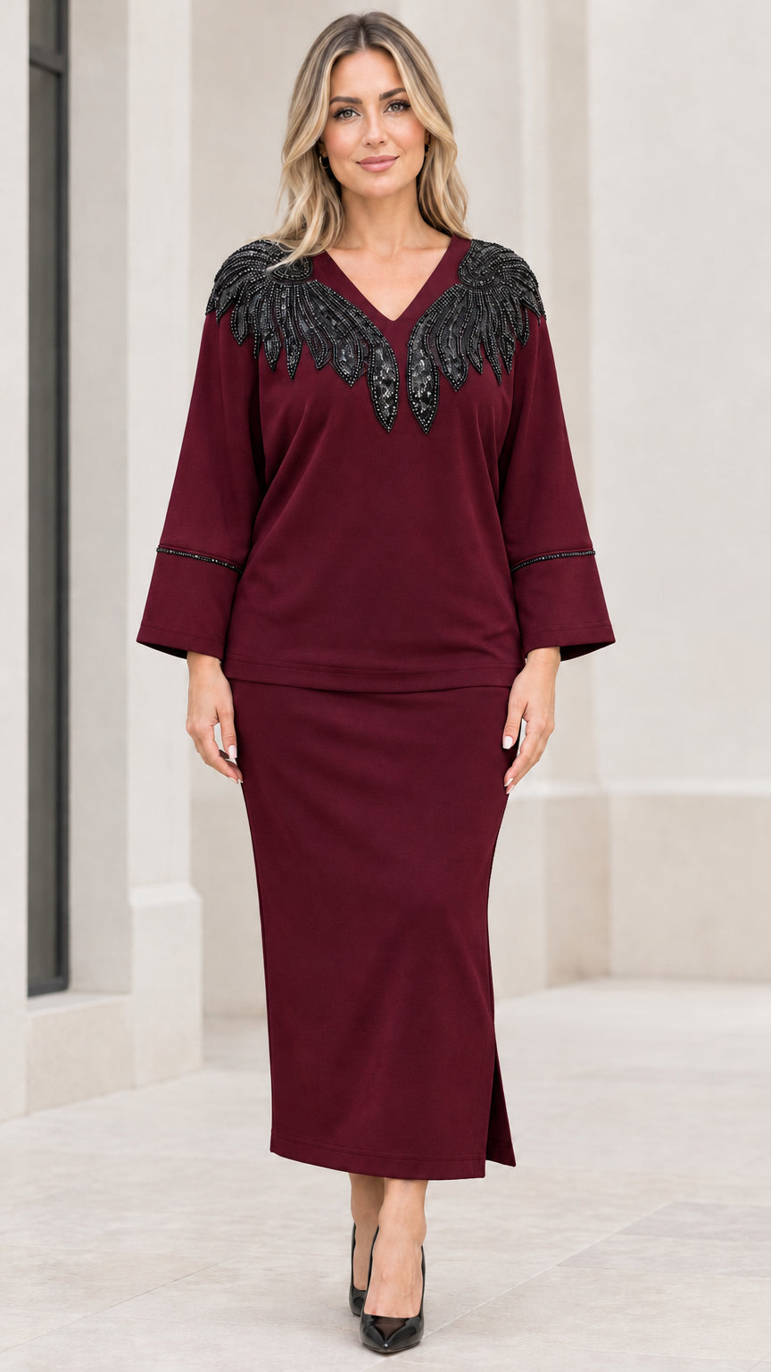 Full front view of burgundy wine red sequin-embellished top and maxi skirt two-piece set